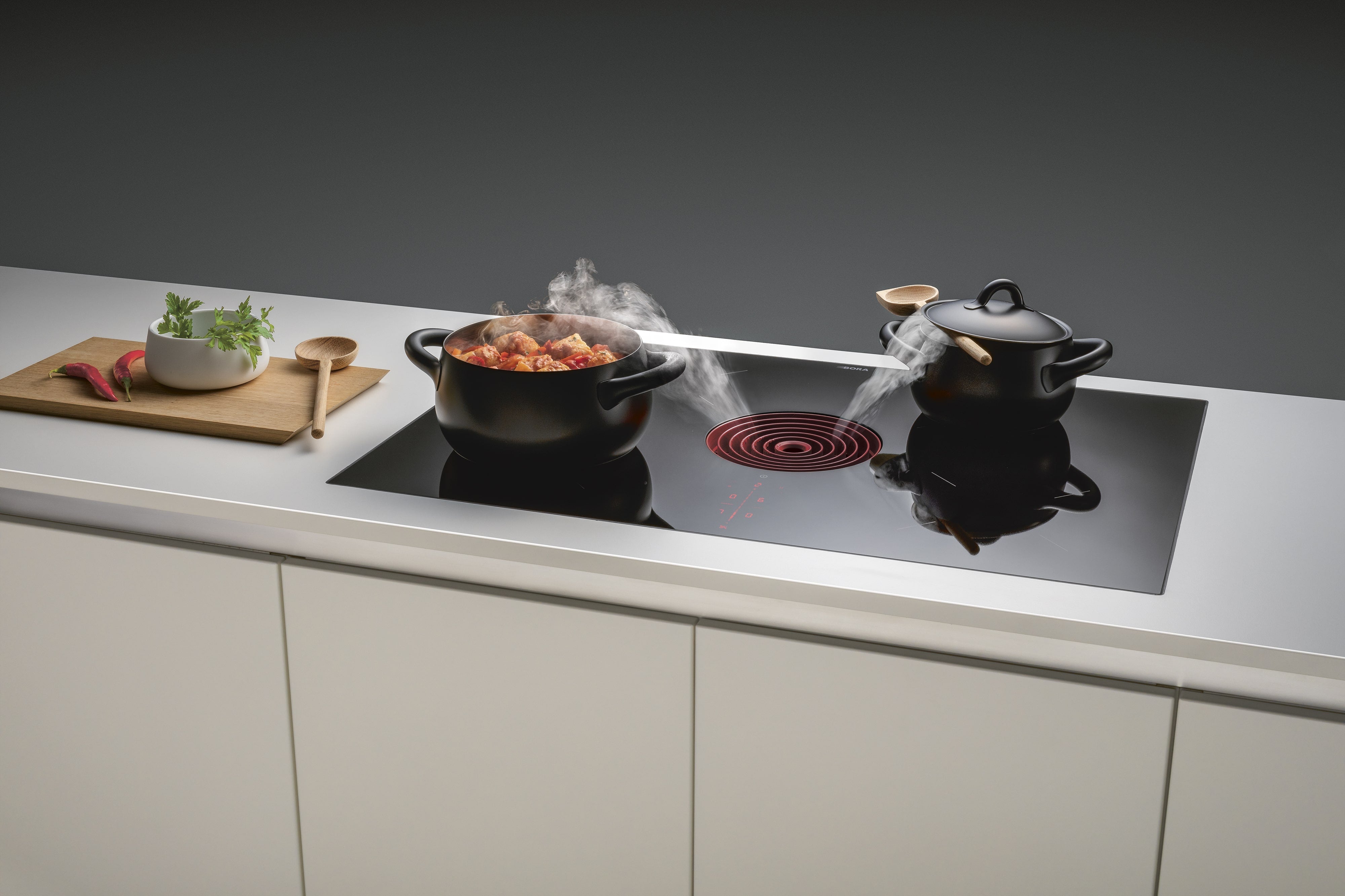 PURE - Table de cuisson induction avec dispositif aspirant (évacuation d'air)