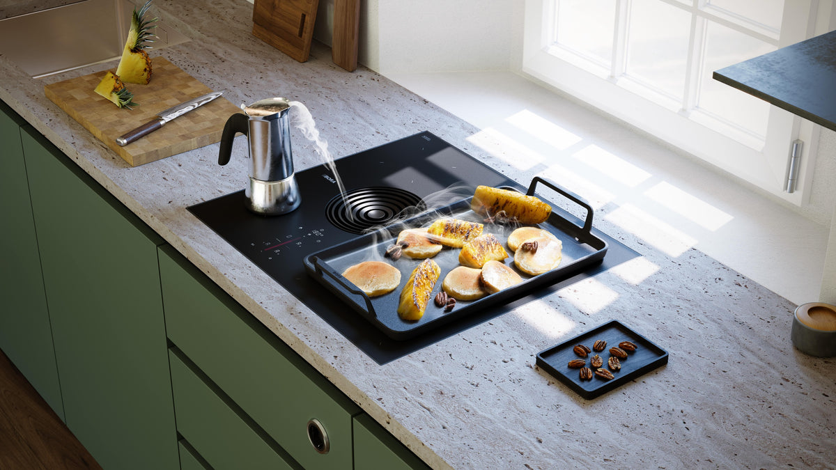 Table de cuisson aspirante BORA S Pure intégrée dans un plan de travail en pierre