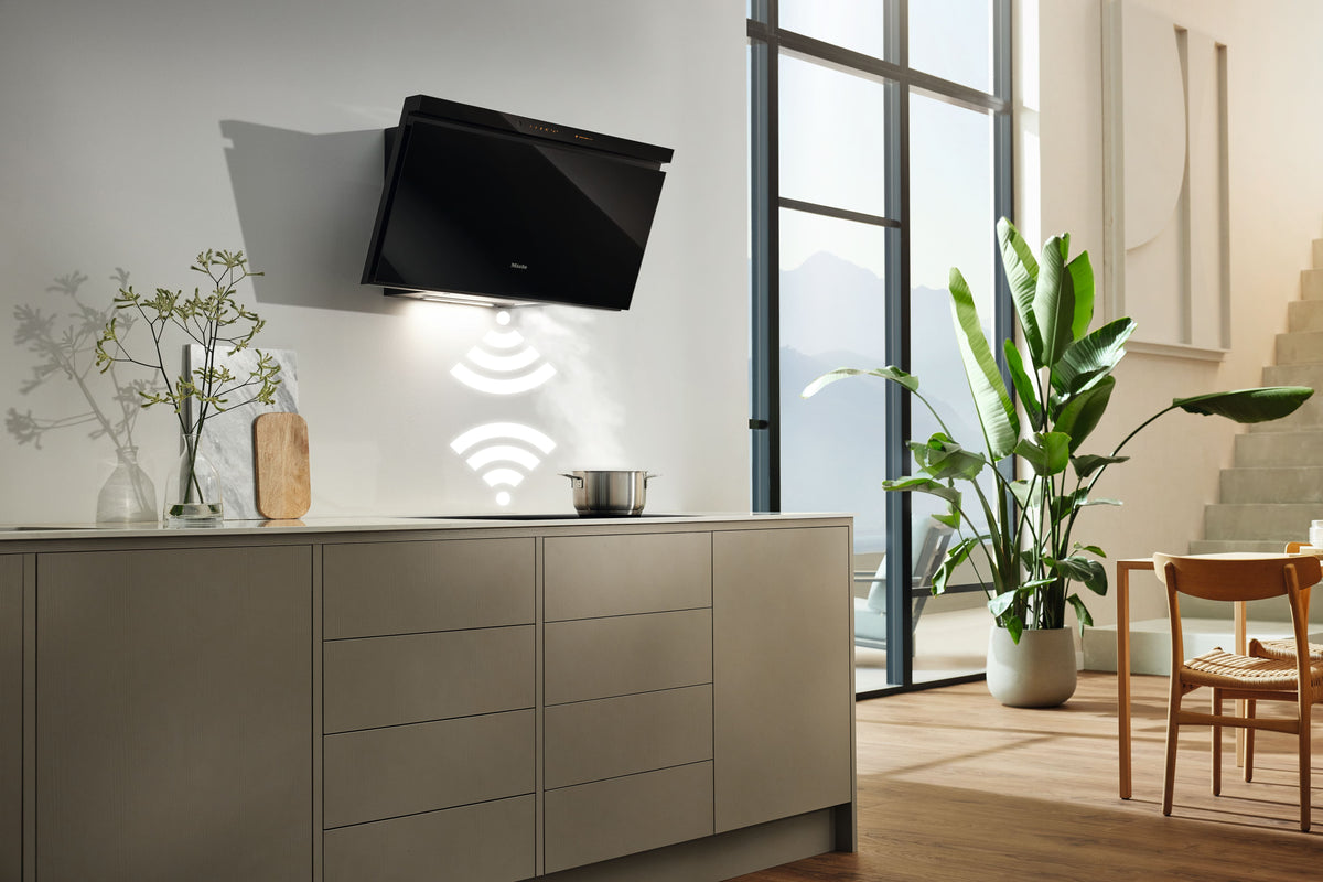 Hotte Miele connectée réagissant aux réglages de la table de cuisson grâce à Con@ctivity