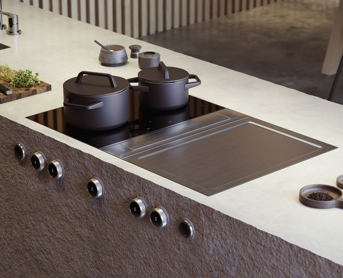 BORA Professional 3.0 avec induction et teppanyaki inox intégré dans un îlot en pierre