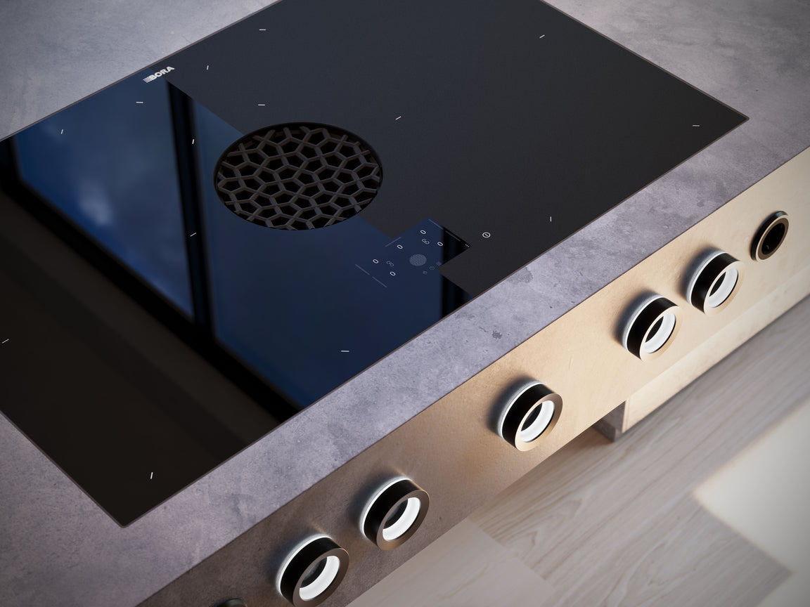 BORA X Pure Max éteint, encastré à fleur dans un plan de travail de cuisine moderne